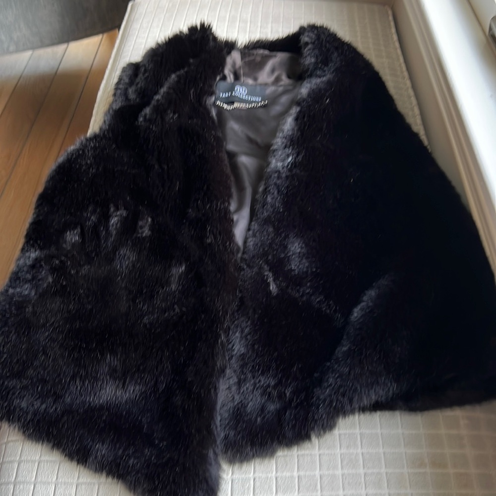 Black faux fur vest with pockets